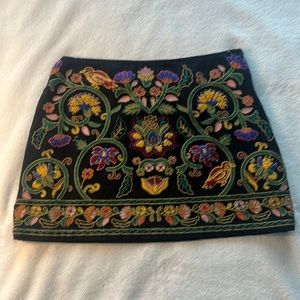Embroidered black mini skirt